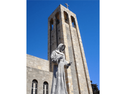 The statue of St. Francis, Cruise shore excursions in Rhodes Greece